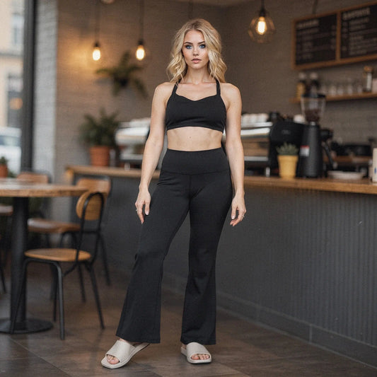 View of high waist flared bootcut yoga pants in black, featuring a comfortable fit and soft stretch fabric