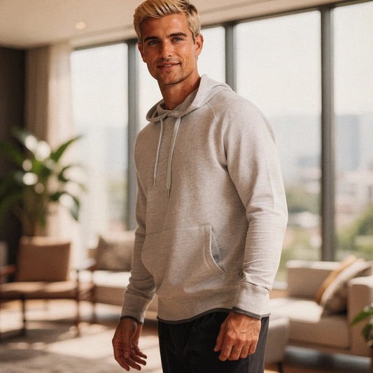 View of a relaxed fit crew neck long sleeve casual hoodie in soft gray fabric, featuring a comfortable design and ribbed cuffs