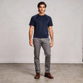 View of a slim fit crew neck short sleeve casual performance t shirt in dark gray, made