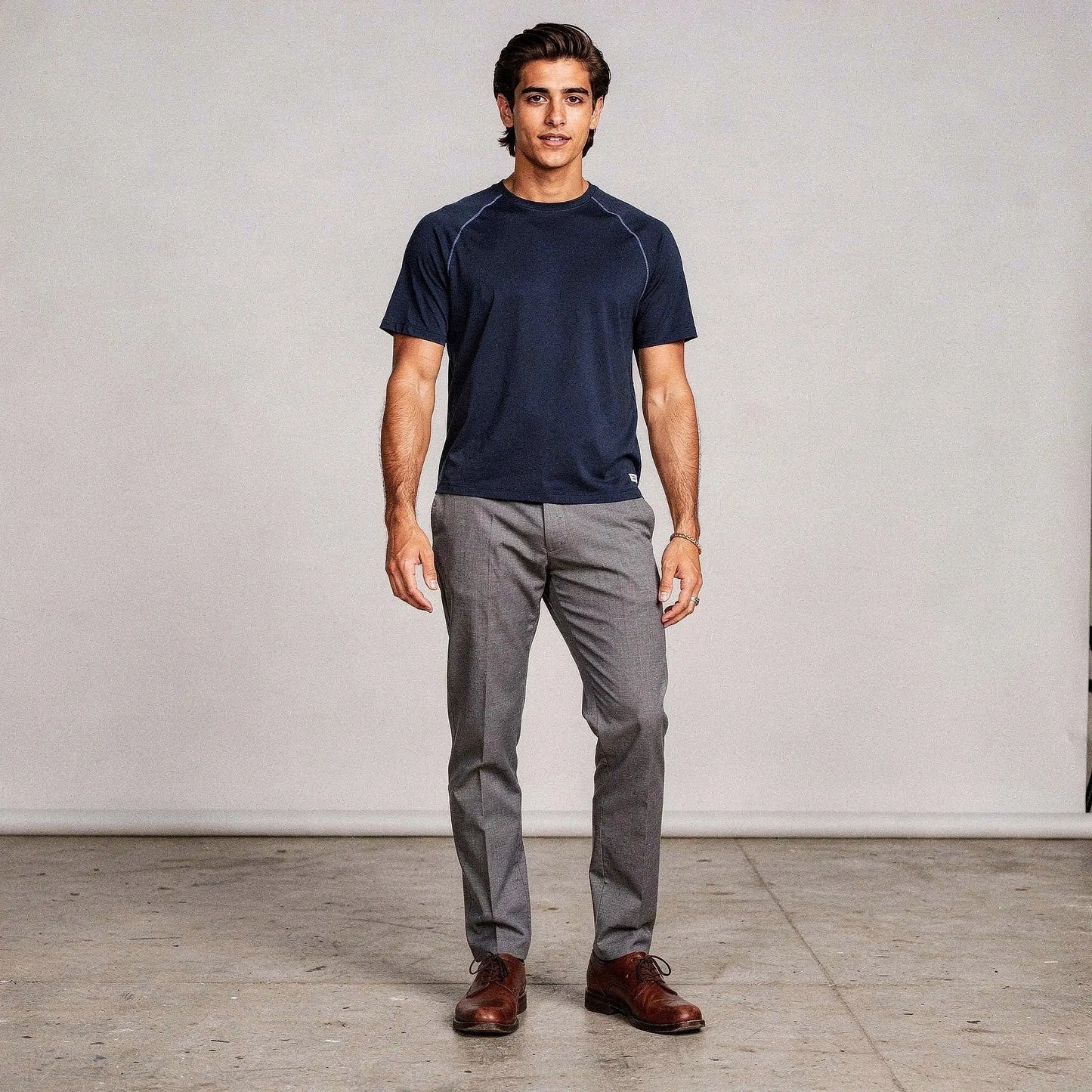 View of a slim fit crew neck short sleeve casual performance t shirt in dark gray, made