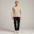 View of a relaxed fit crew neck long sleeve t shirt in dark gray, made