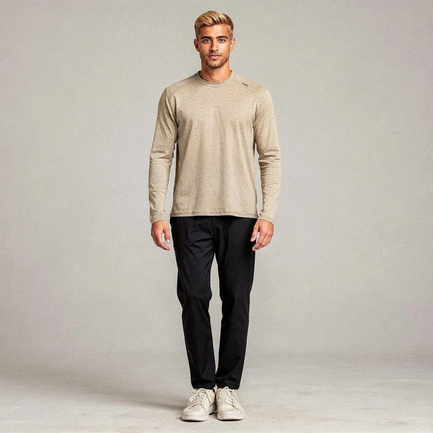 View of a relaxed fit crew neck long sleeve t shirt in dark gray, made
