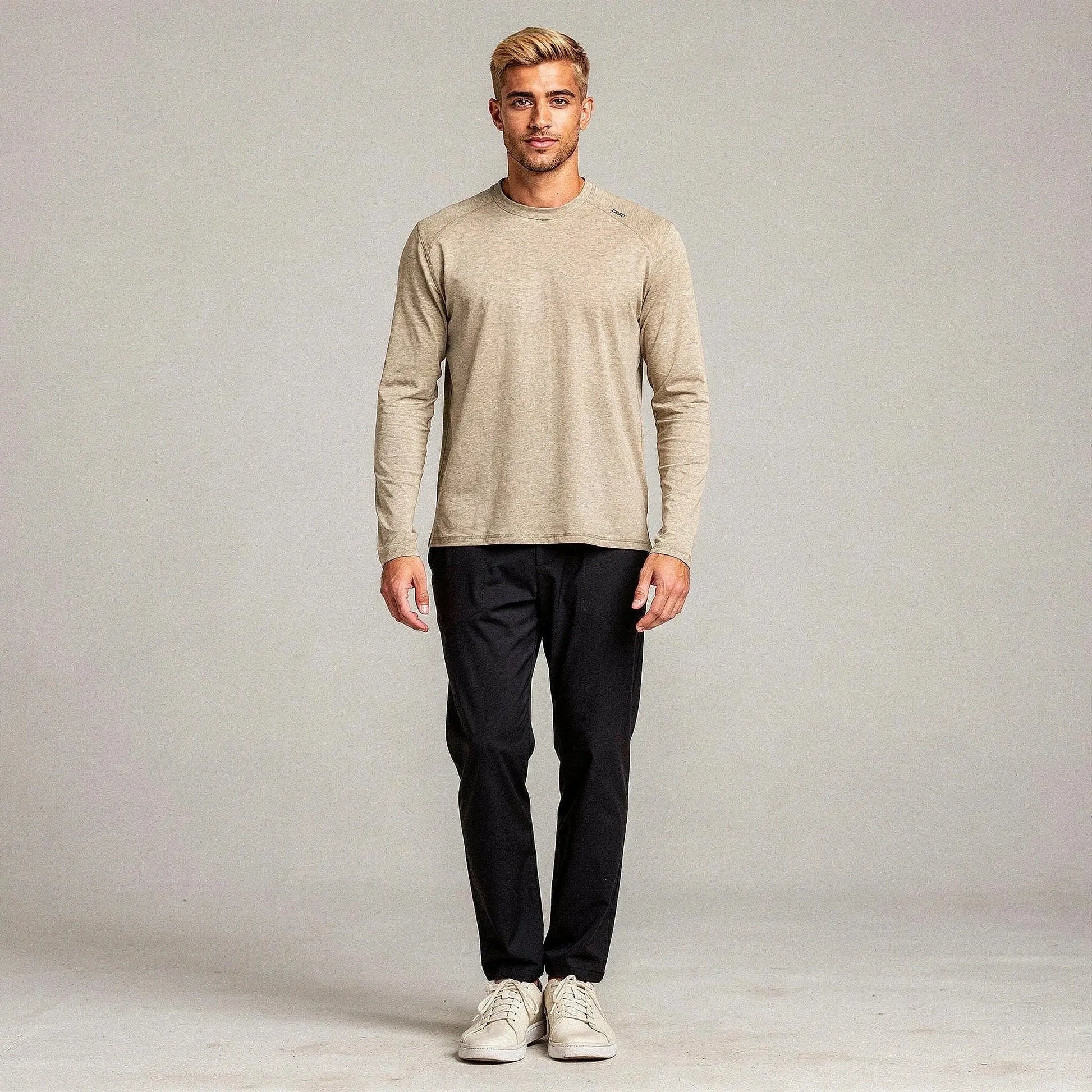 View of a relaxed fit crew neck long sleeve t shirt in dark gray, made