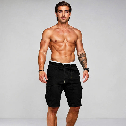 View of relaxed fit baggy cargo shorts in olive green, featuring a drawstring waist and multiple pockets