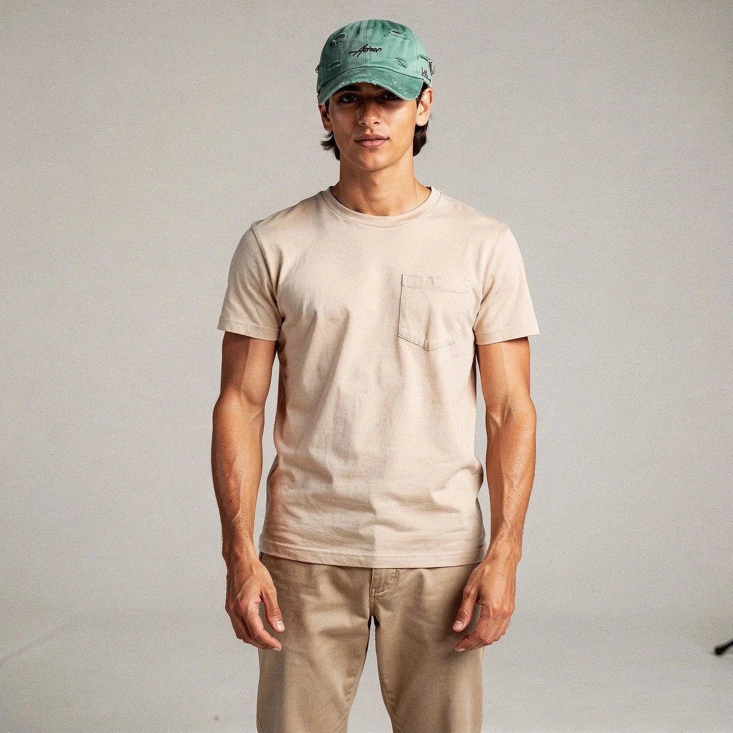 View of a relaxed fit crew neck long sleeve casual t shirt in soft cotton, featuring a classic design in a muted gray color