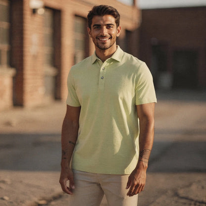 View of a light blue slim fit short sleeve polo shirt featuring a V neck and soft cotton fabric