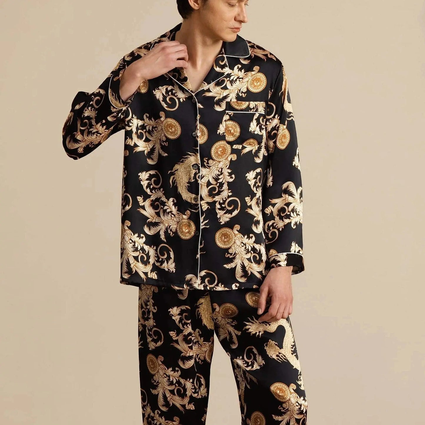 View of relaxed fit long sleeve silk pajamas set in deep navy blue, featuring a notch collar and elegant sheen