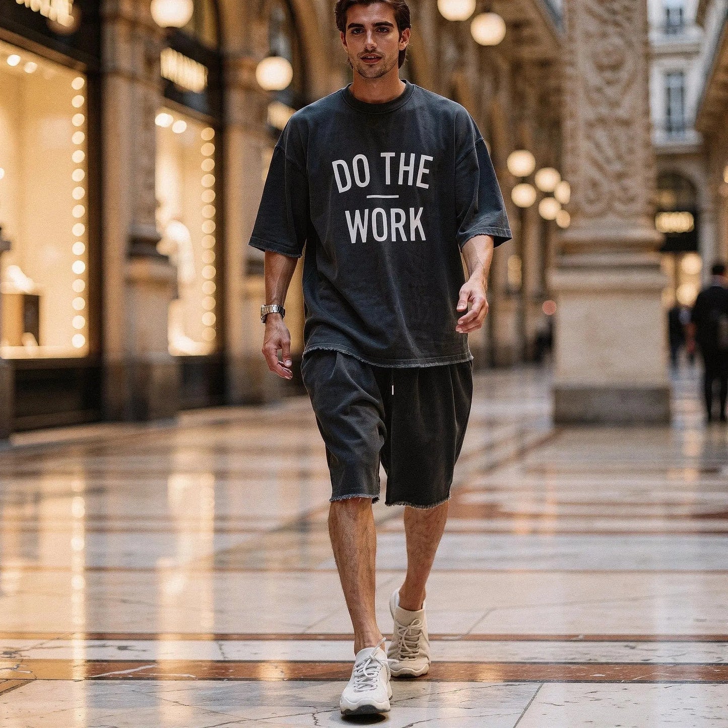 View of a relaxed fit crew neck short sleeve casual sports set in light gray, showcasing soft fabric and comfortable design