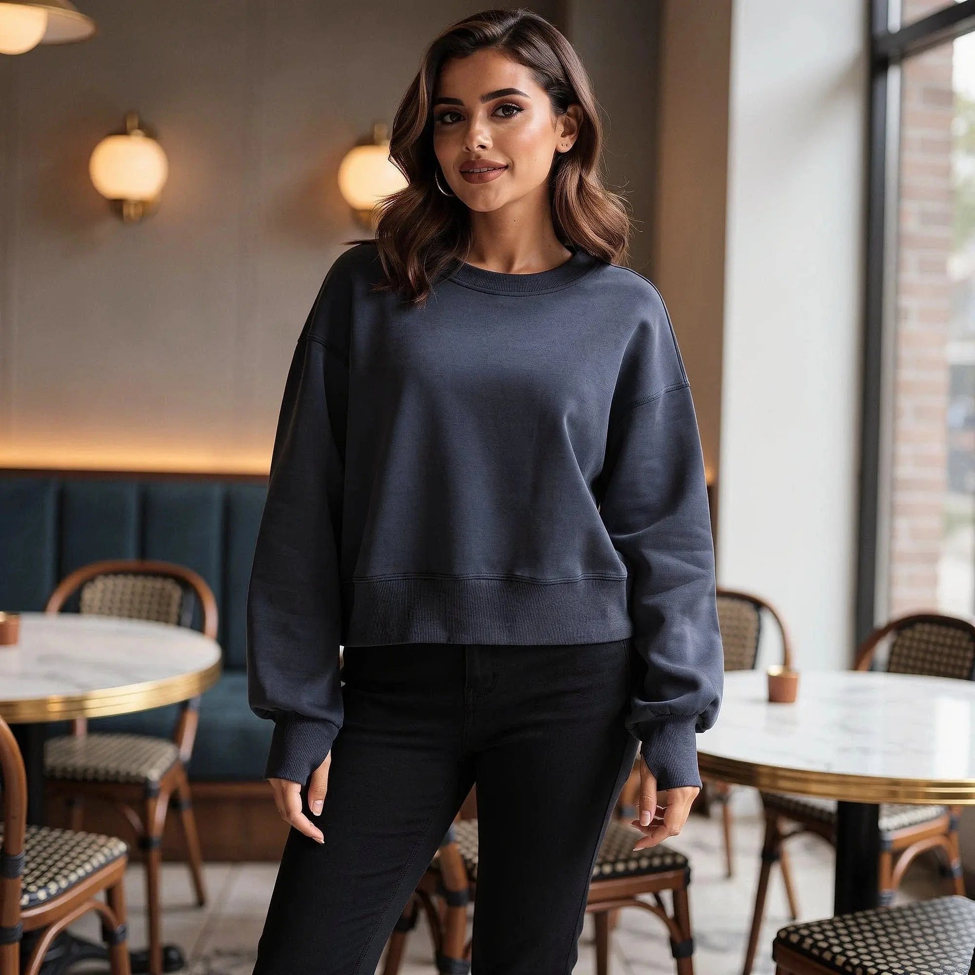 Light gray relaxed fit crew neck sweatshirt with long sleeves, featuring a soft fabric and simple design, view