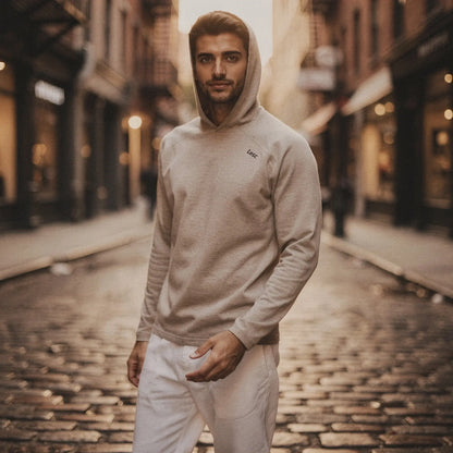 Lightweight gray hoodie featuring a slim fit, long sleeves, and a kangaroo pocket, view