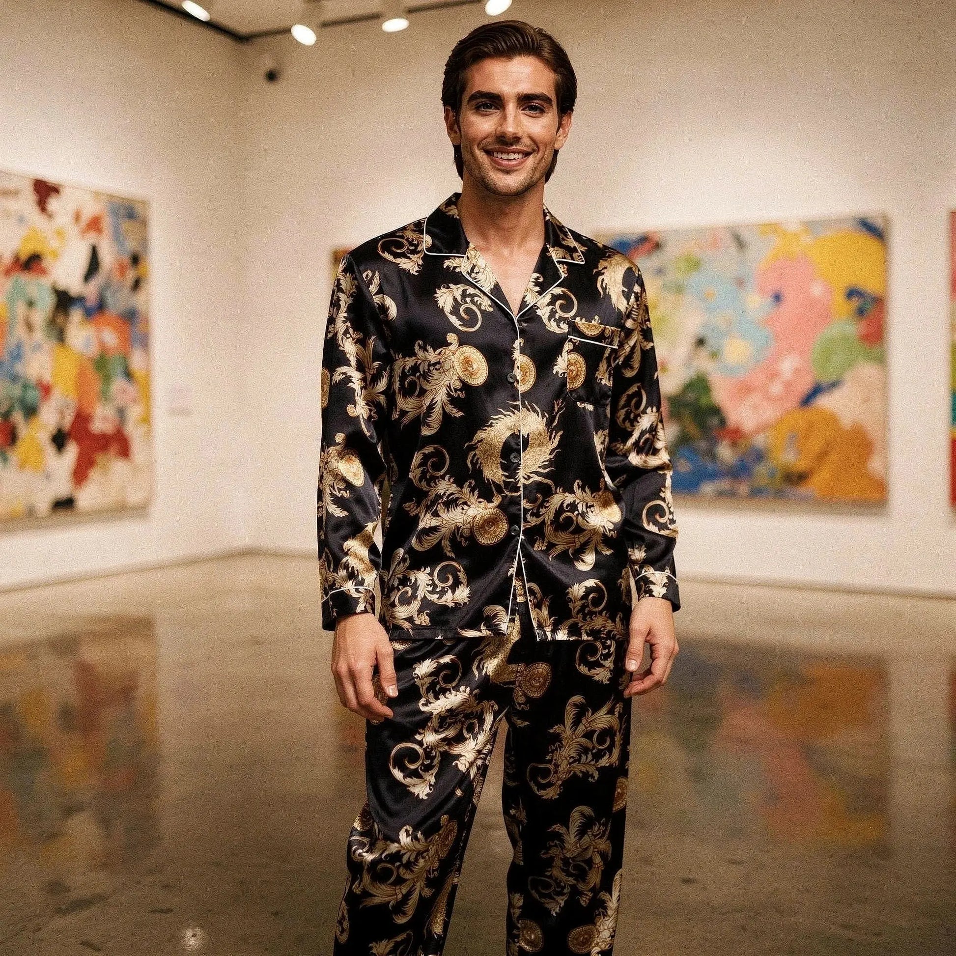 View of relaxed fit long sleeve silk pajamas set in deep navy blue, featuring a notch collar and smooth fabric texture