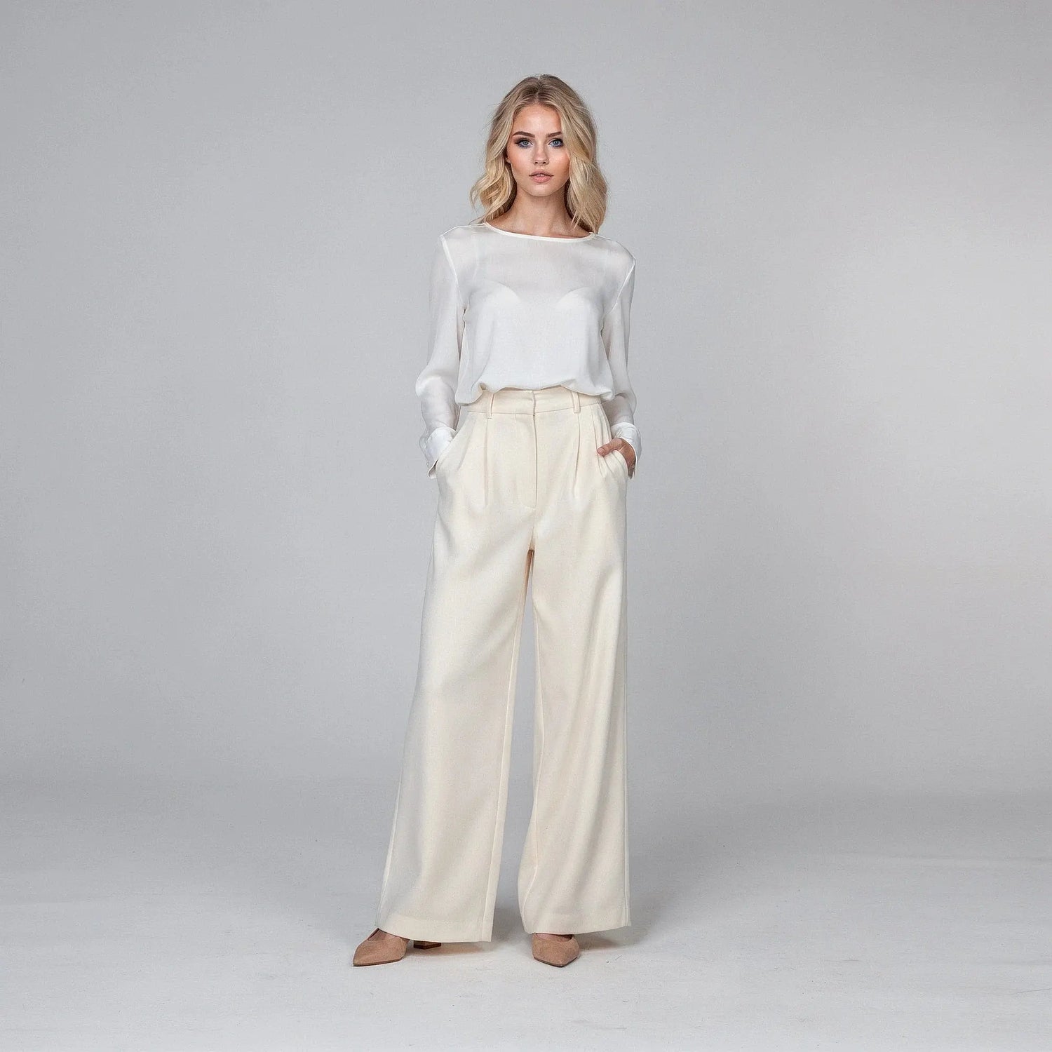 View of relaxed fit high waist wide leg casual pants in soft beige fabric, perfect for spring wear