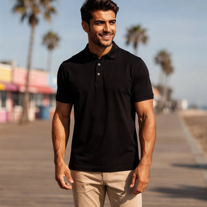 View of a navy blue slim fit short sleeve polo shirt featuring a V neck and soft cotton material