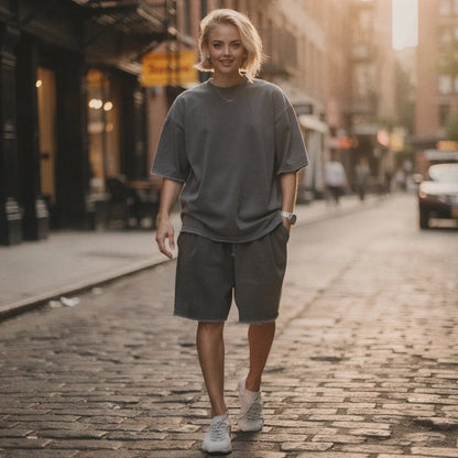 View of a relaxed fit crew neck short sleeve midi dress in soft cotton, featuring a comfortable drape and subtle pockets