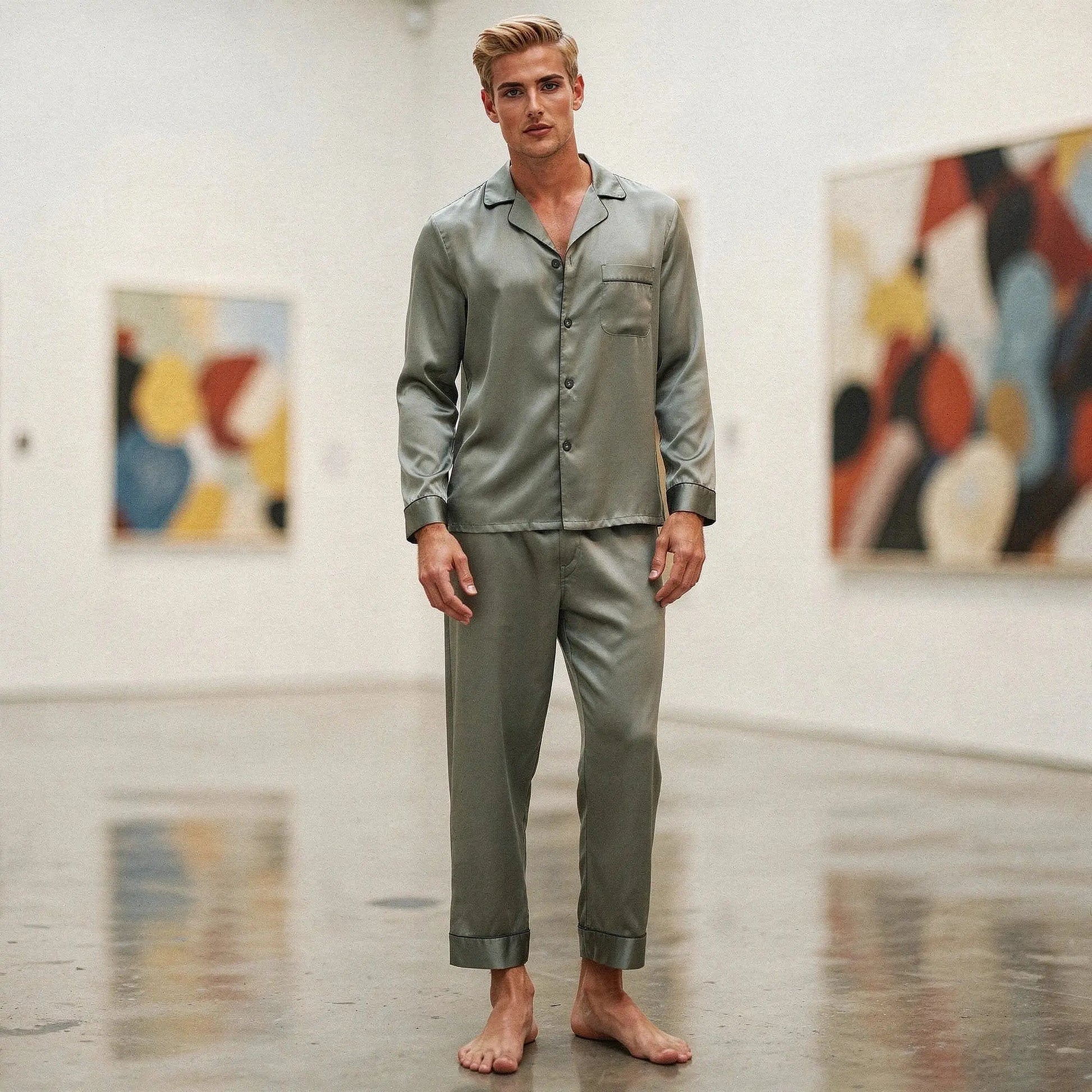 View of a pure silk pajama set in deep navy, featuring a relaxed fit and notch collar design