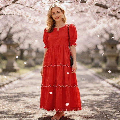 View of a flowy A line midi dress in soft fabric, featuring a round neck and delicate floral pattern in pastel colors