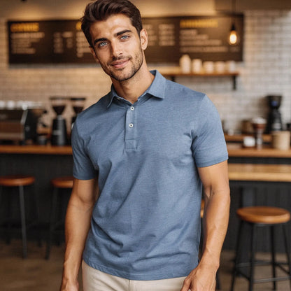 View of a navy blue slim fit short sleeve polo shirt featuring a V neck and soft cotton material
