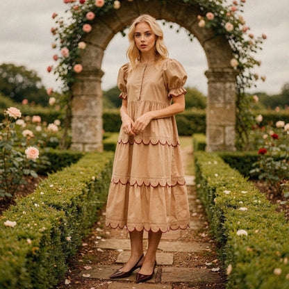 View of a flowy A line midi dress in soft fabric, featuring a round neck and a vibrant floral pattern
