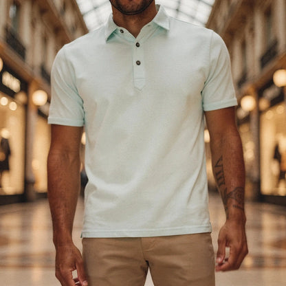Light grey slim fit short sleeve polo shirt with a V neck, featuring a soft cotton blend and detailed stitching