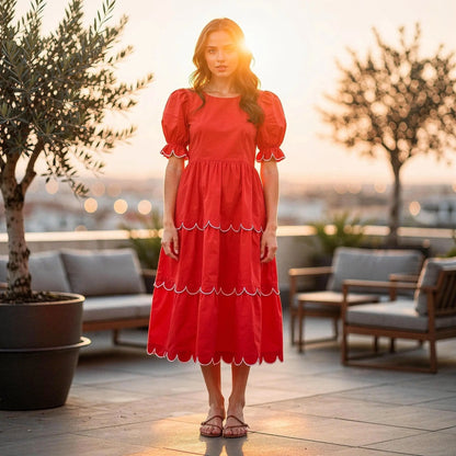 View of a flowy A line midi dress in soft fabric, featuring a round neck and a vibrant floral pattern