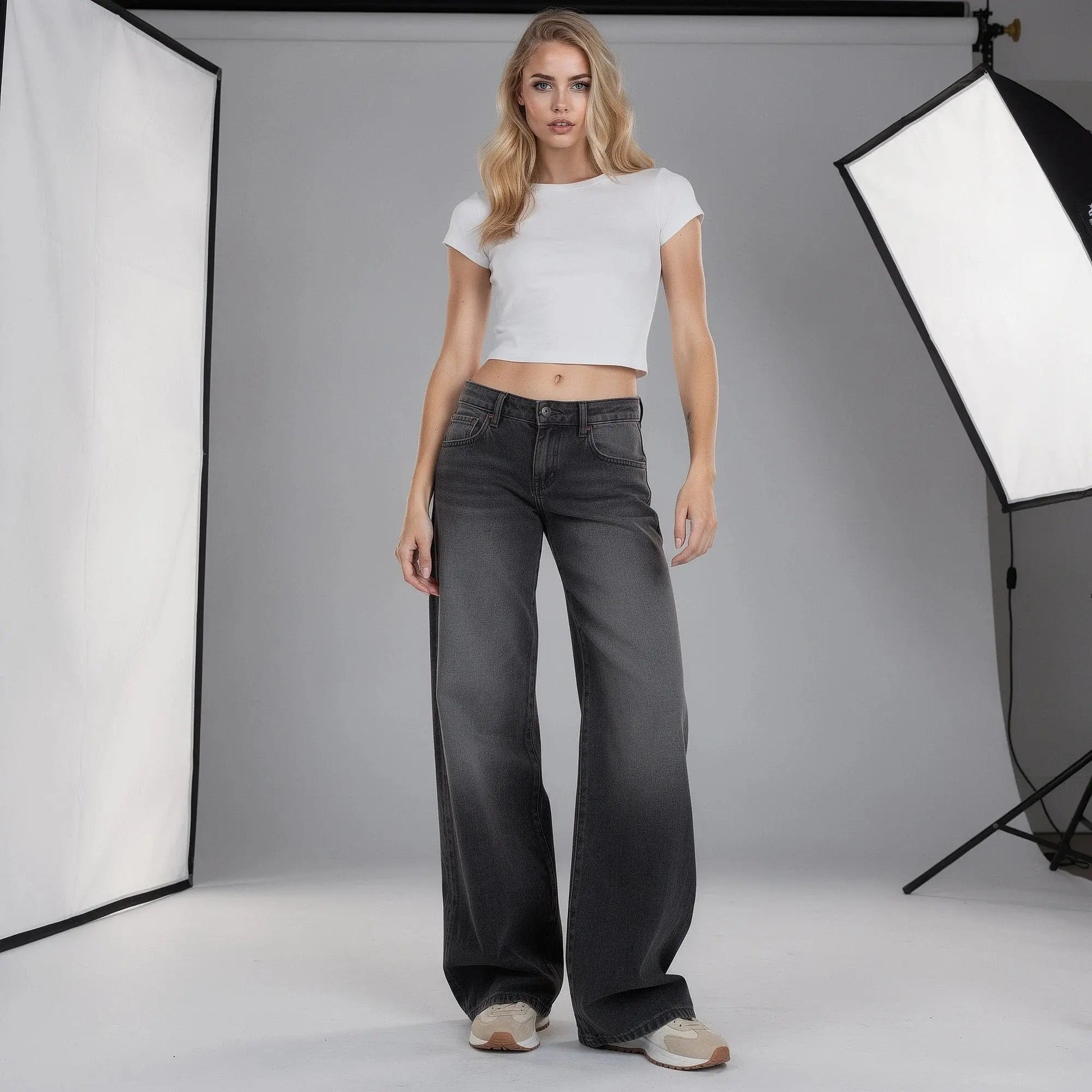 View of high waist vintage casual baggy jeans in light blue denim with a relaxed fit and five pocket design