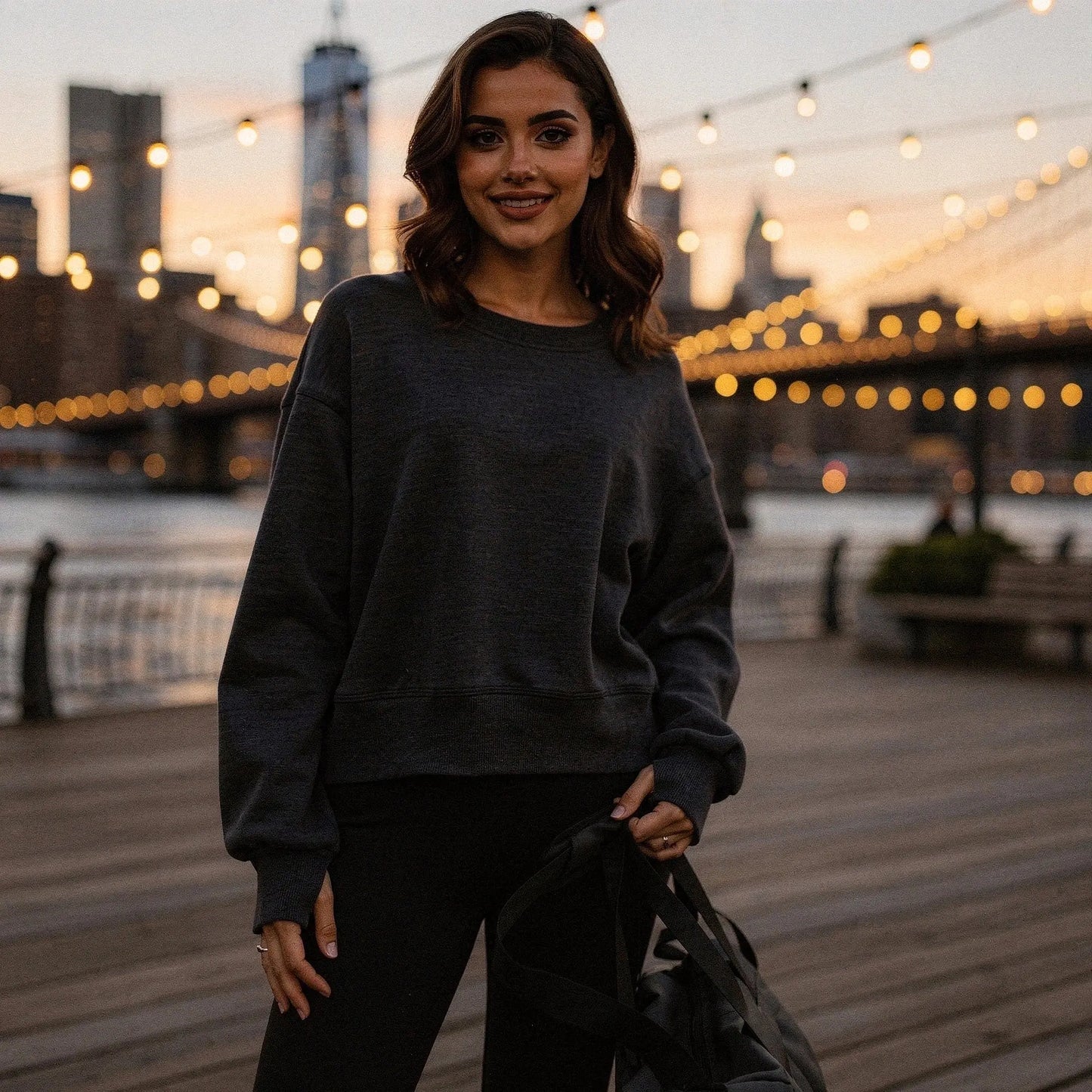 Light gray relaxed fit crew neck sweatshirt with long sleeves and soft fabric, view showcasing stitching and neckline