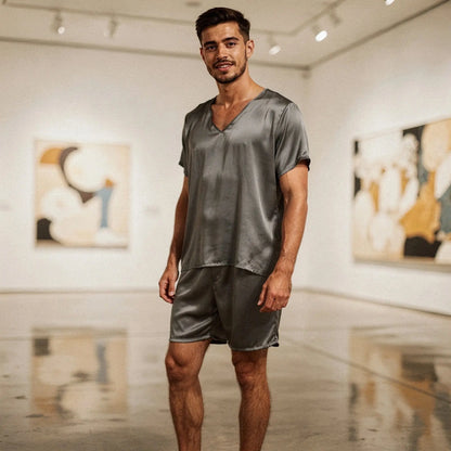 Light gray short sleeve pajama set with a round neck and comfortable shorts, detailed view showcasing fabric texture