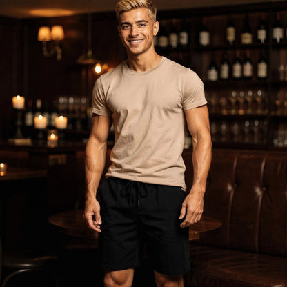 View of a relaxed fit short sleeve casual summer t shirt and shorts set in light gray cotton fabric, showcasing stitching and pocket details