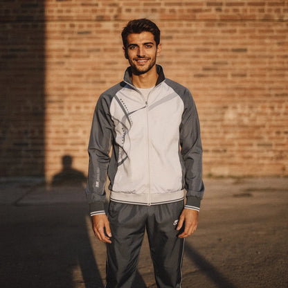 View of a relaxed fit crew neck short sleeve sportswear set in light gray, showcasing soft fabric and casual style