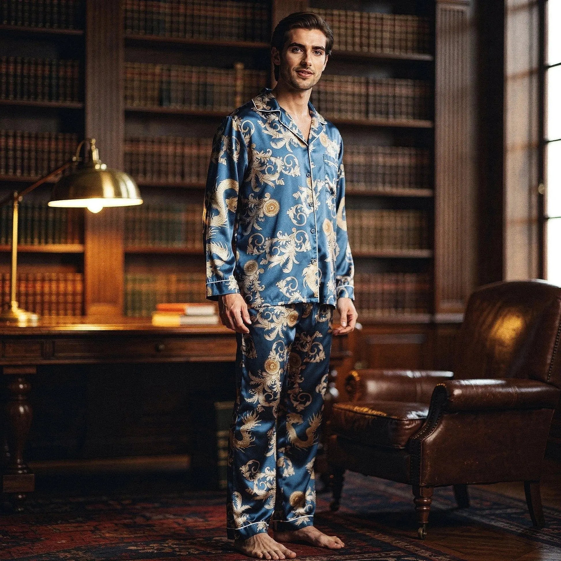 View of relaxed fit long sleeve silk pajamas set in deep navy blue, featuring a notch collar and smooth fabric texture