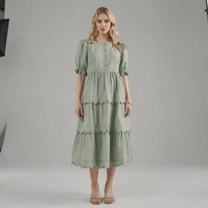 View of a flowy A line midi dress in soft fabric, featuring a round neck and short sleeves, perfect for summer occasions