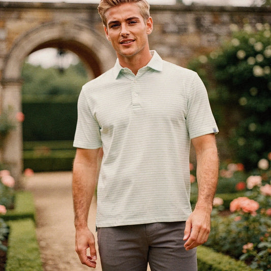 View of a slim fit crew neck short sleeve polo in light blue, featuring a smooth fabric and a casual design