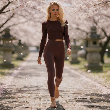 Black high waisted fitted 78 leggings with pockets, made from stretchy material, view showing fabric texture