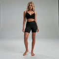 View of black high rise cropped leggings made from stretchy fabric, featuring a fitted design for comfortable workouts