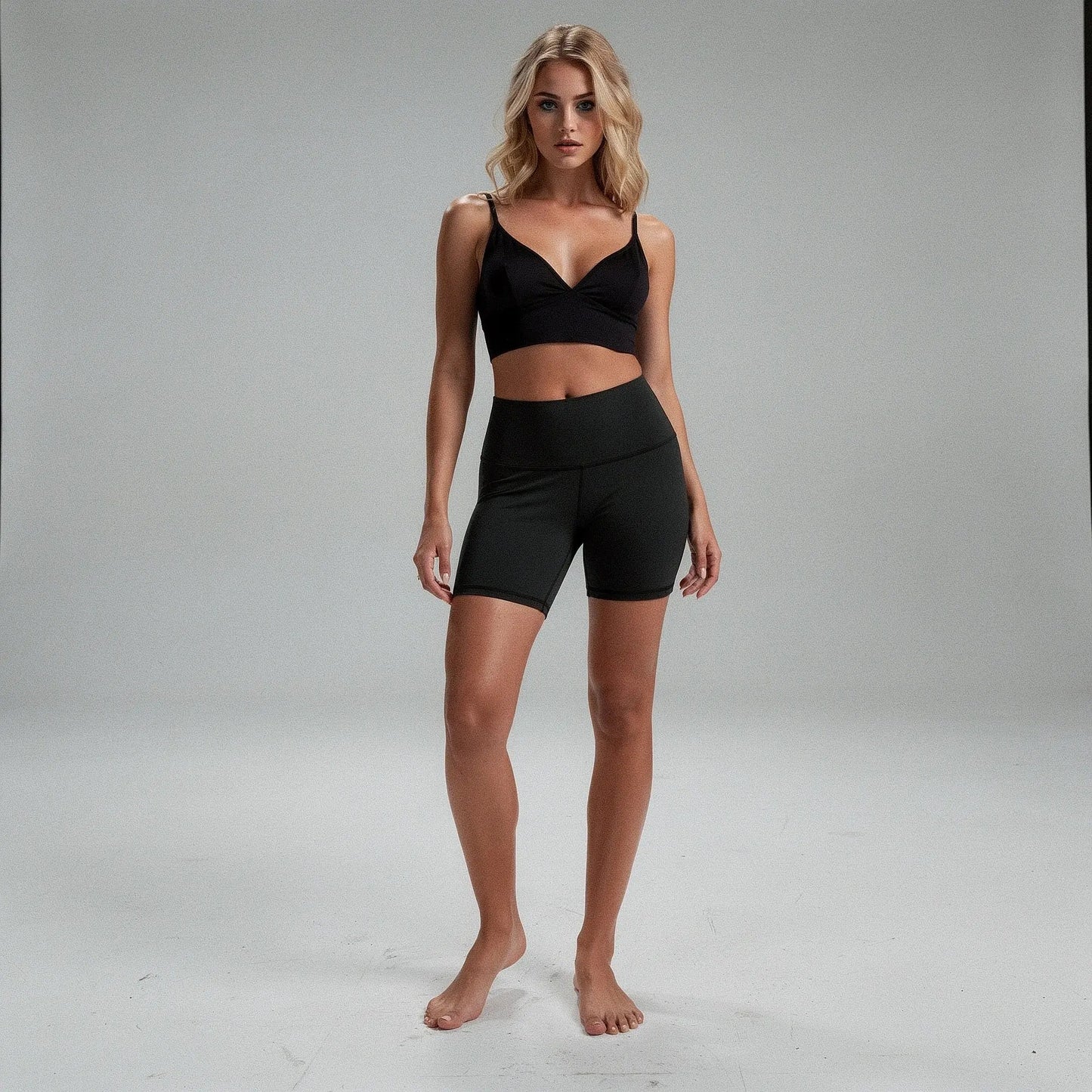 View of black high rise cropped leggings made from stretchy fabric, featuring a fitted design for comfortable workouts
