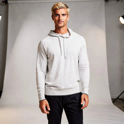 View of a relaxed fit crew neck long sleeve casual hoodie in light gray, featuring a soft fabric and ribbed cuffs