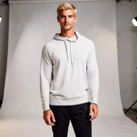 View of a relaxed fit crew neck long sleeve casual hoodie in light gray, featuring a soft fabric and ribbed cuffs