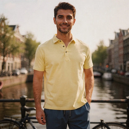 View of a slim fit short sleeve polo shirt in light gray, featuring a V neck and soft cotton material