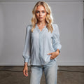 Light pink sleeveless chiffon mini casual top with a relaxed fit, featuring a round neckline and flowing silhouette, view