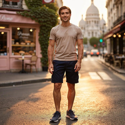 View of relaxed fit baggy cargo shorts in light khaki, featuring drawstring waist and multiple pockets