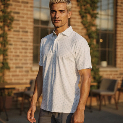 View of a relaxed fit crew neck short sleeve golf polo in light blue, made of soft cotton blend fabric