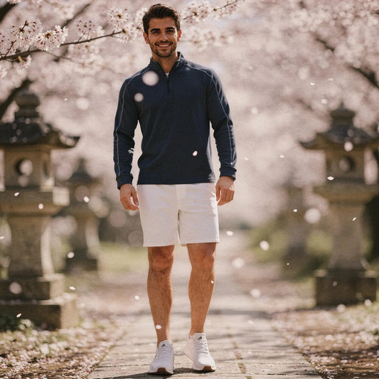 View of a lightweight pullover in dark gray, featuring a quarter zip and slim fit design, suitable for casual office wear and golf