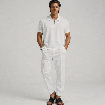 View of a slim fit short sleeve sport suit set in dark gray, featuring a zipper and casual style