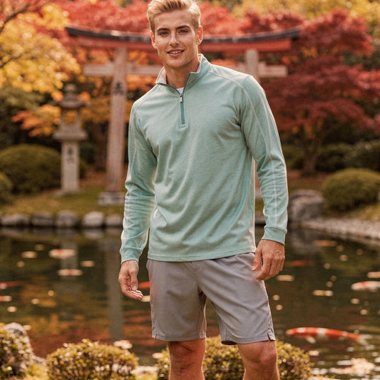 View of a lightweight quarter zip pullover in dark gray, featuring a slim fit and soft fabric for casual wear
