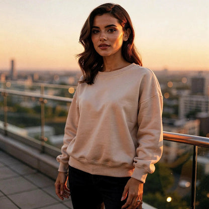 Light gray relaxed fit crew neck sweatshirt with long sleeves and ribbed cuffs, view showcasing fabric texture