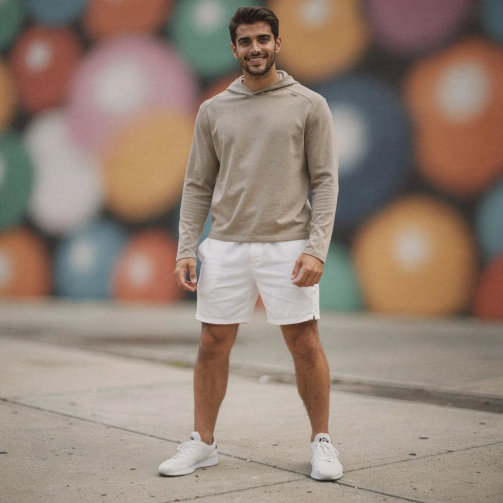 Lightweight gray hoodie with a slim fit, long sleeves, and a view showcasing the clean design and stitching
