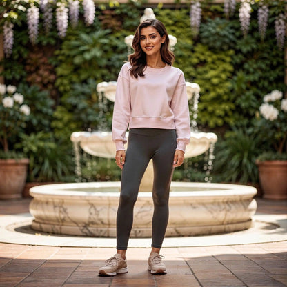 Light gray relaxed fit crew neck sweatshirt with long sleeves and soft fabric, view showing stitching and neckline