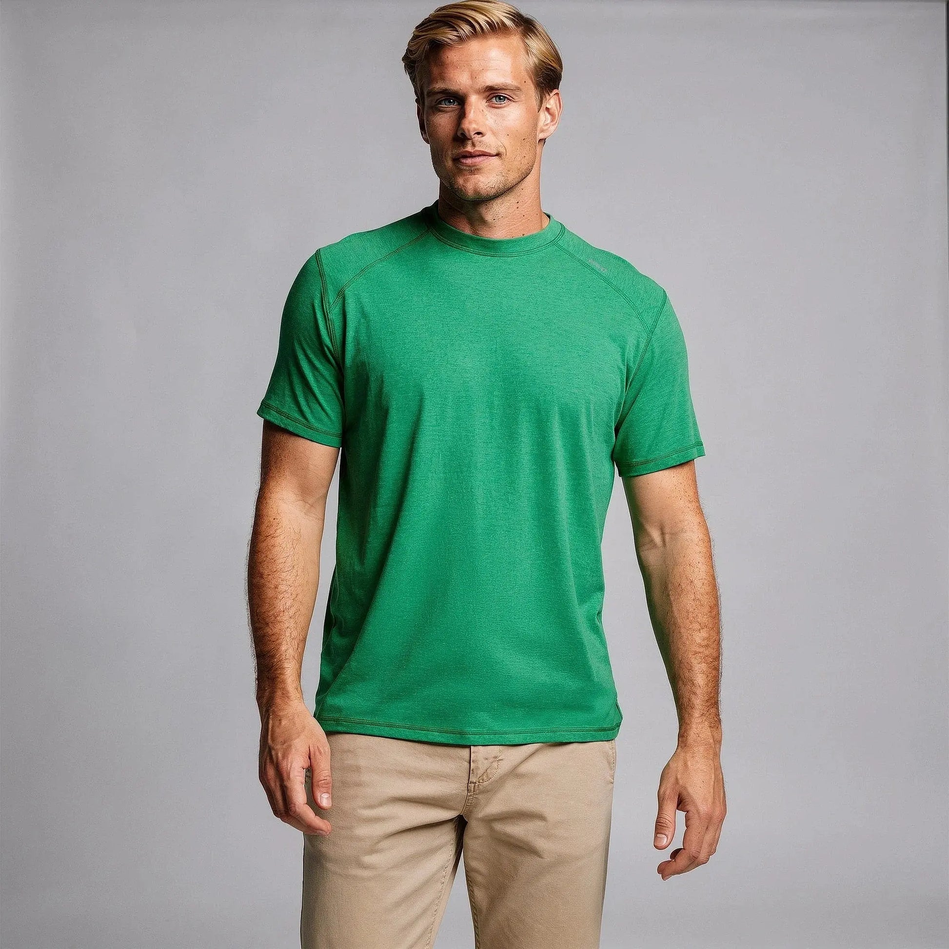 View of a slim fit crew neck short sleeve fitness t shirt in dark gray, made