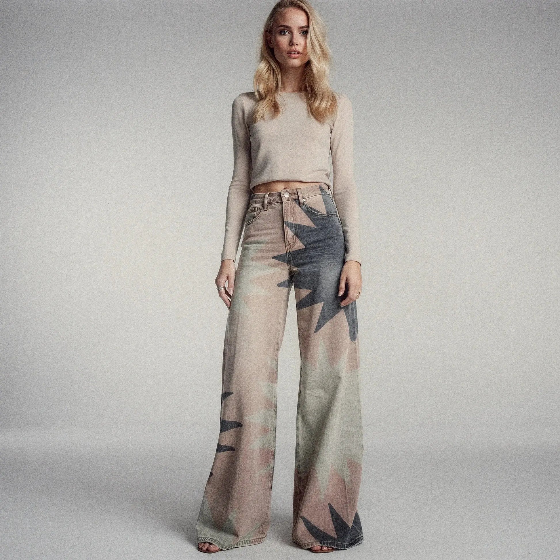 View of women's wide leg casual pants featuring a geometric print in vibrant colors and lightweight fabric