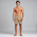 Light gray linen shorts with a relaxed fit and drawstring waist, knee length, view